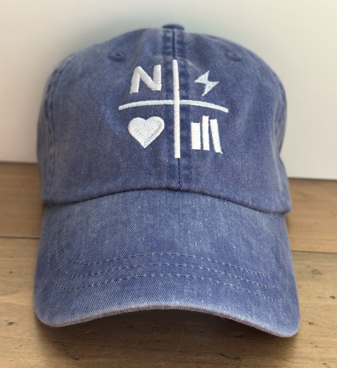 Faded purple Nightstand hat with white embroidered logo