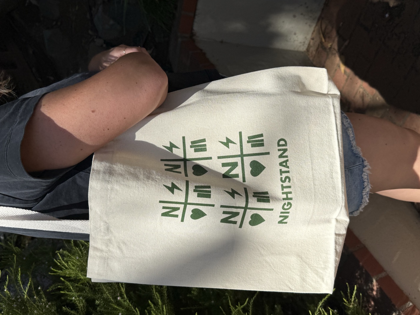 Nightstand tote bag being carried